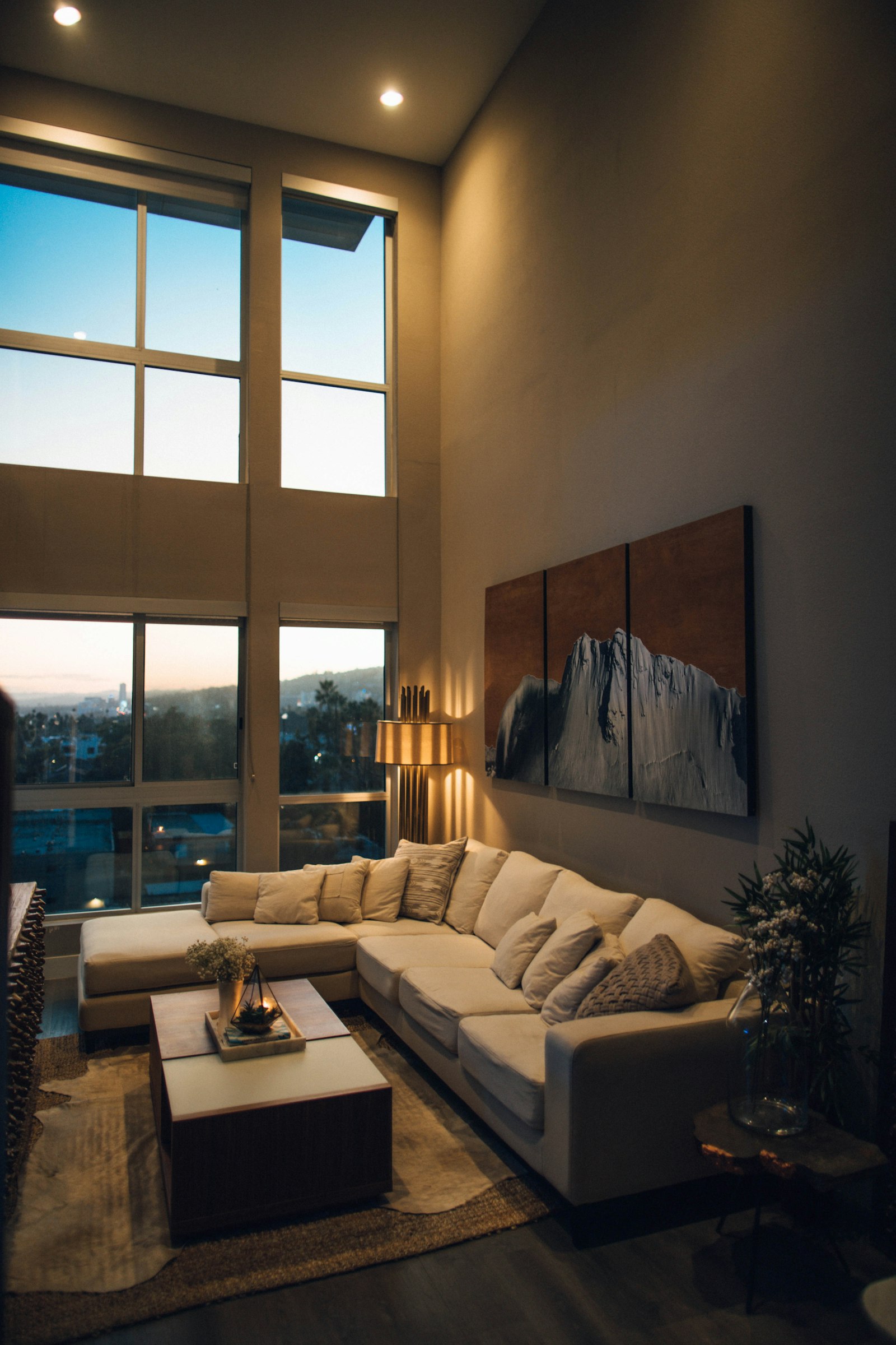 Couch beside a window representing 3BHK flats near Nagasandra Metro Station