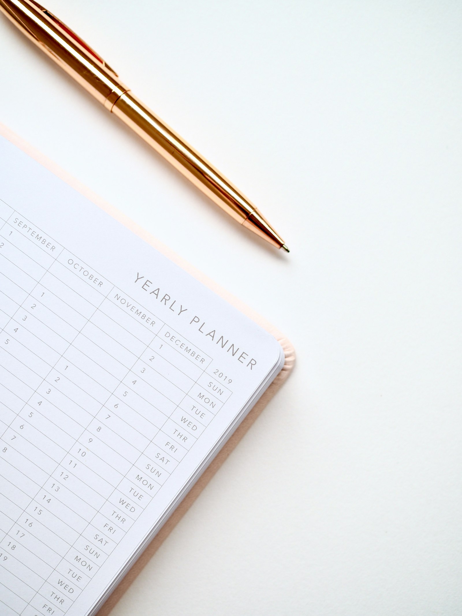 Yearly planner notebook representing the Bangalore locality comparison prices, yield and investment guide