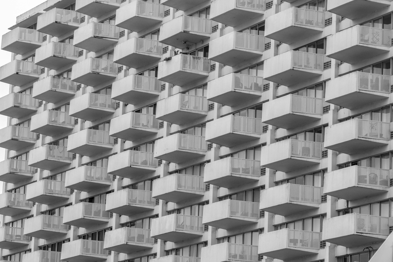 White concrete building representing Bangalore Metro Phase 2 real estate impact by corridor