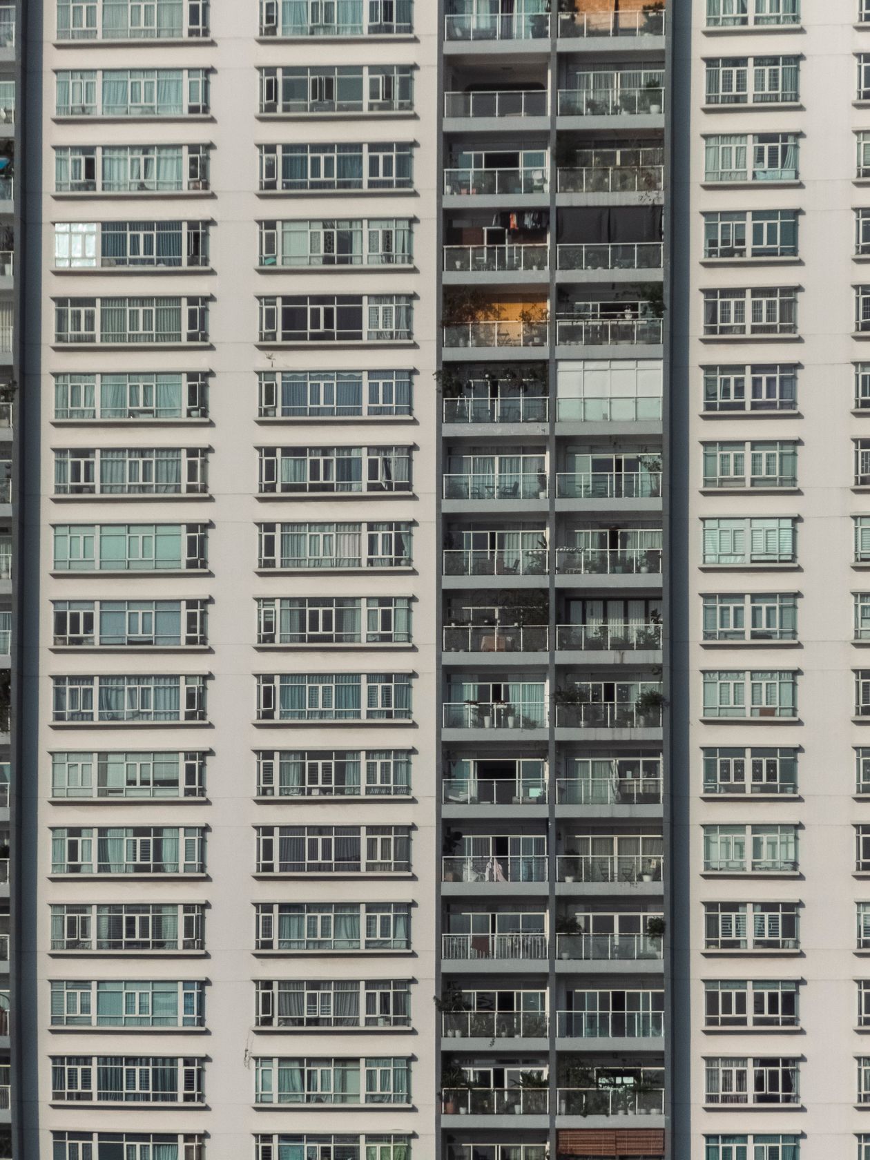 Exterior facade of a high-rise residential apartment building