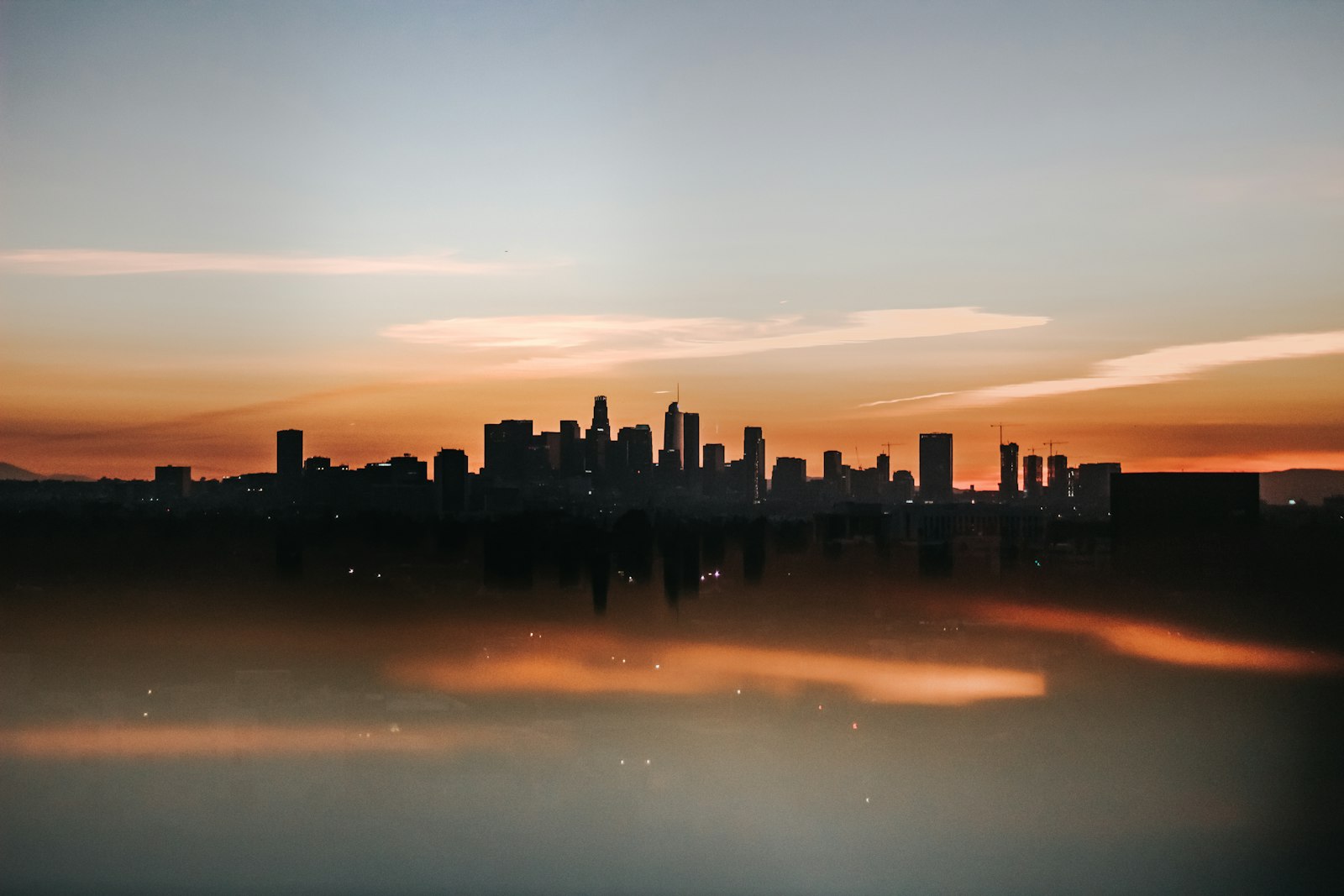 Cityscape at golden hour representing buying property in Bangalore after the BBMP-to-GBA transition