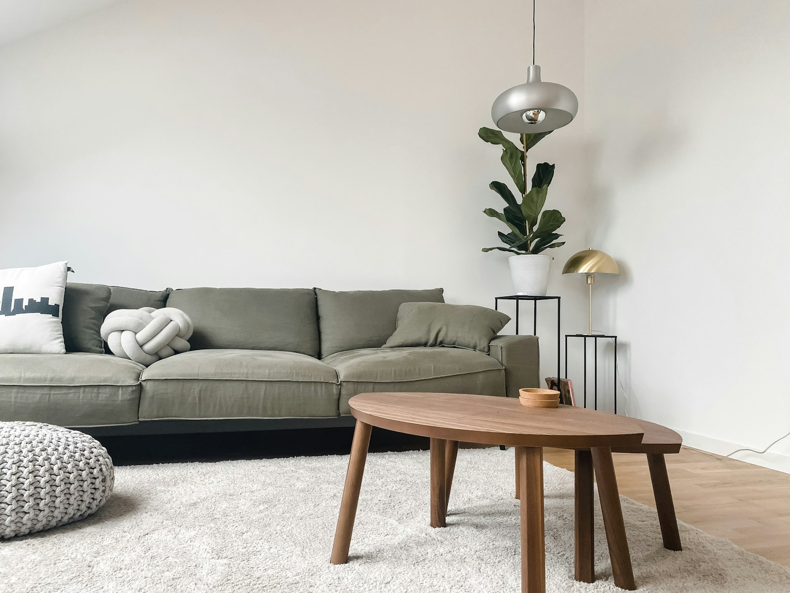 Sofa near a coffee table representing BDA versus BBMP versus Gramathana sites key differences