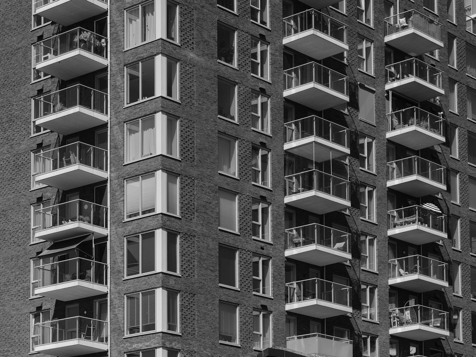 Modern apartment building representing INLAND Ascott style residence in Bondel