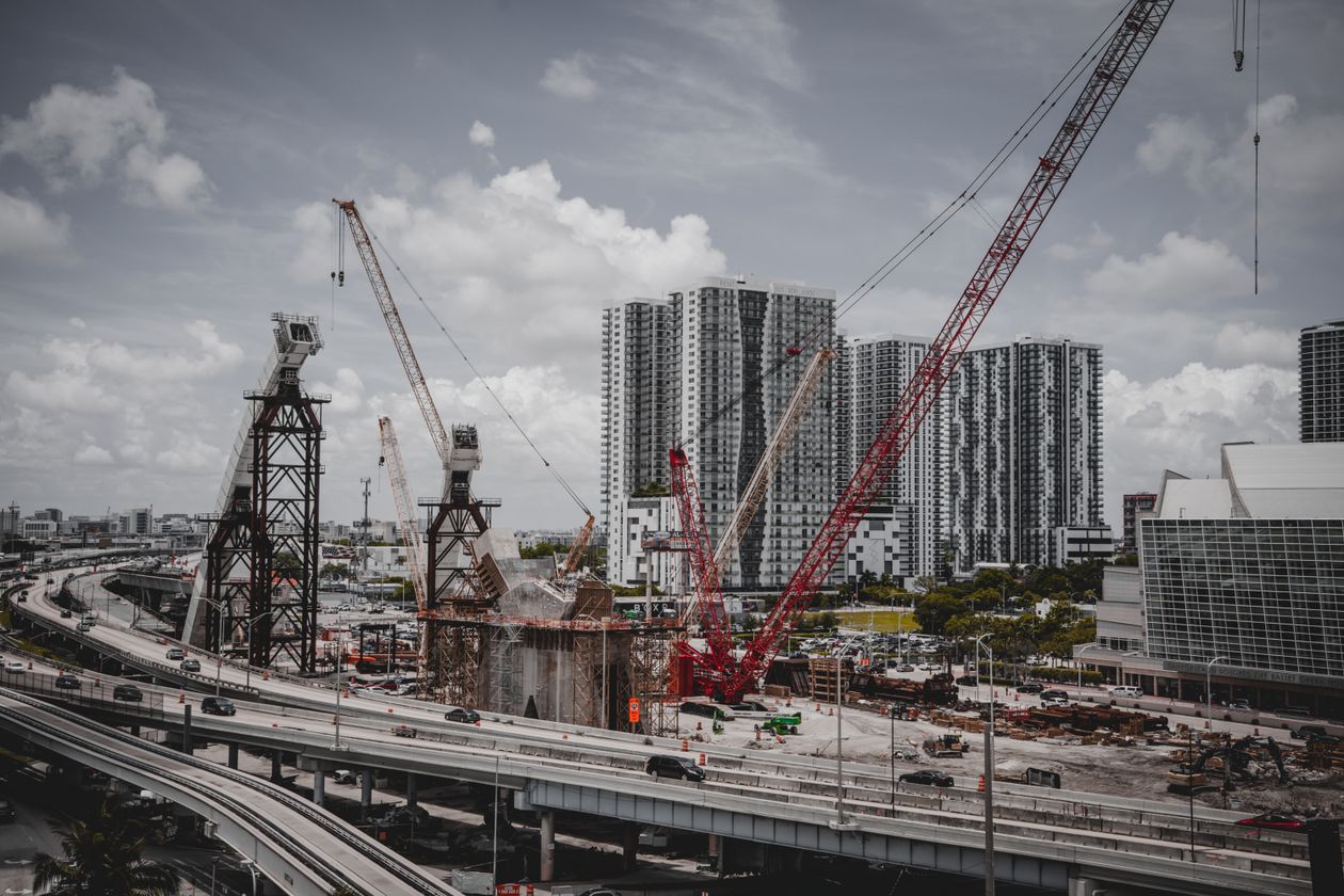 Construction cranes at a city infrastructure site