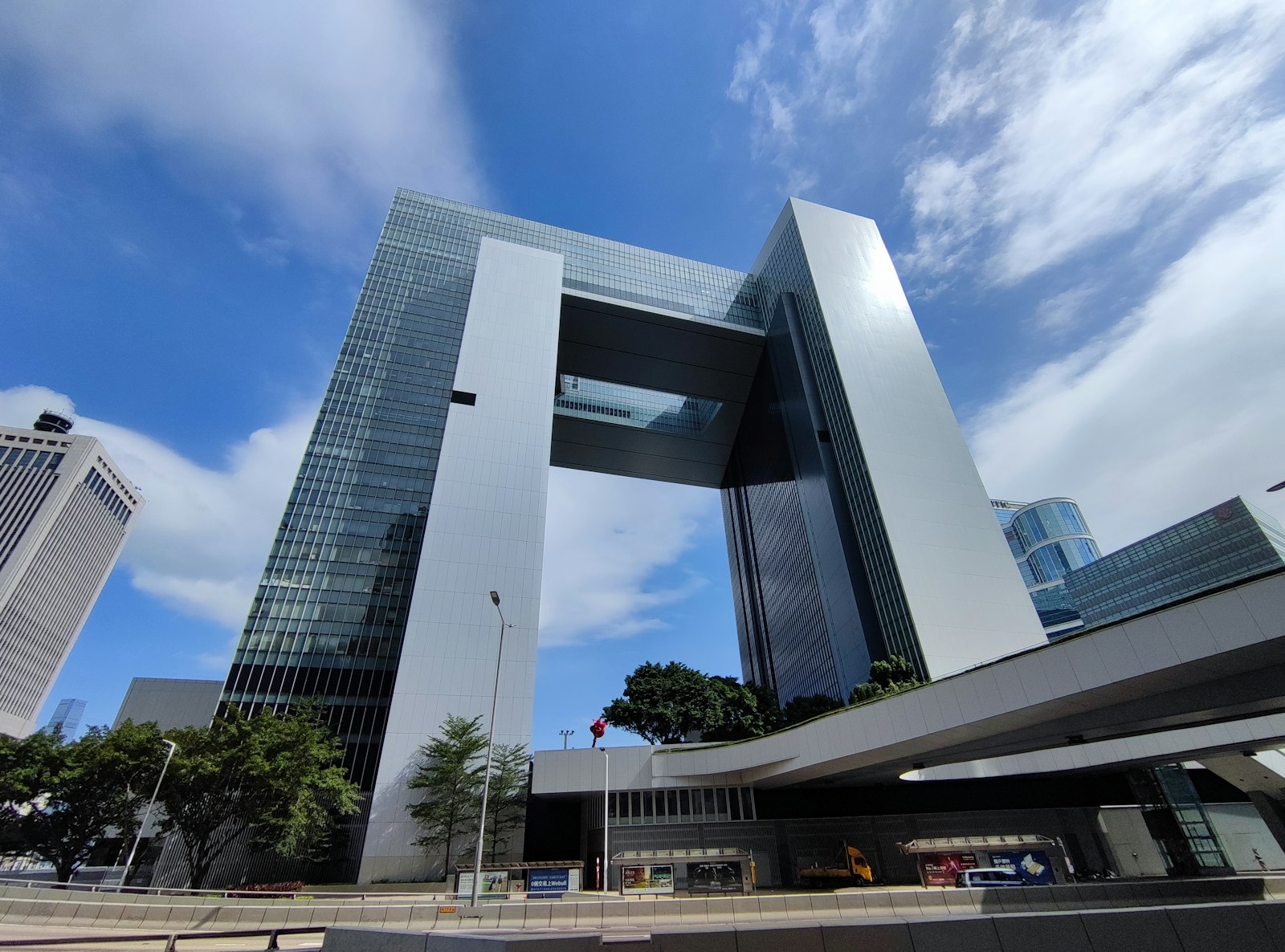 Tall building in the city representing the complete NRI guide to buy property in Bangalore from Canada