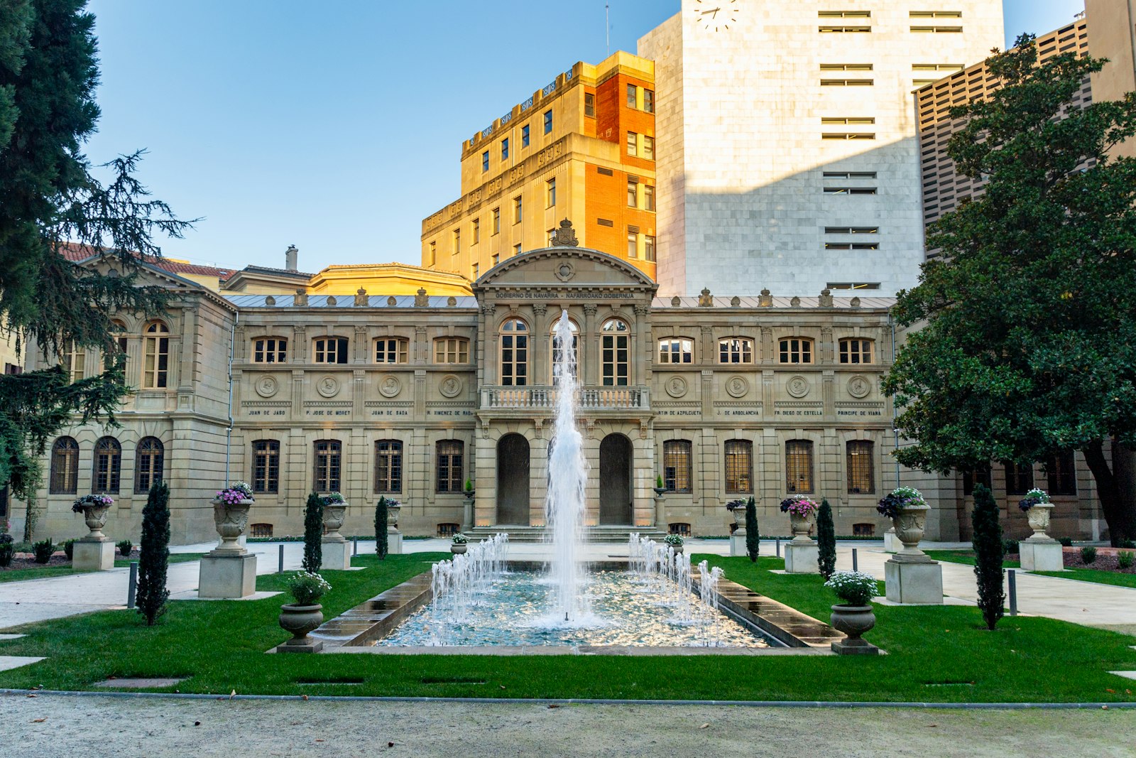 Building with a fountain representing the complete NRI guide to buy property in Bangalore from Singapore