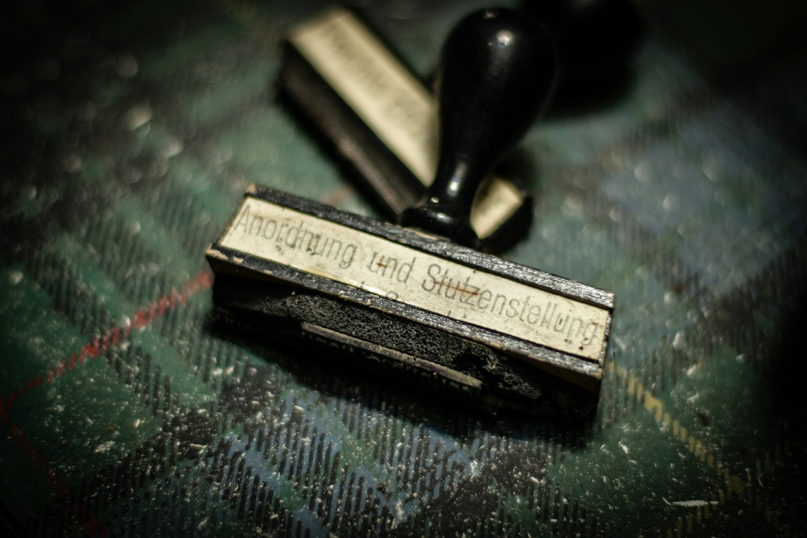 Close-up of a rubber stamp representing coastal zone management and property development in Karnataka