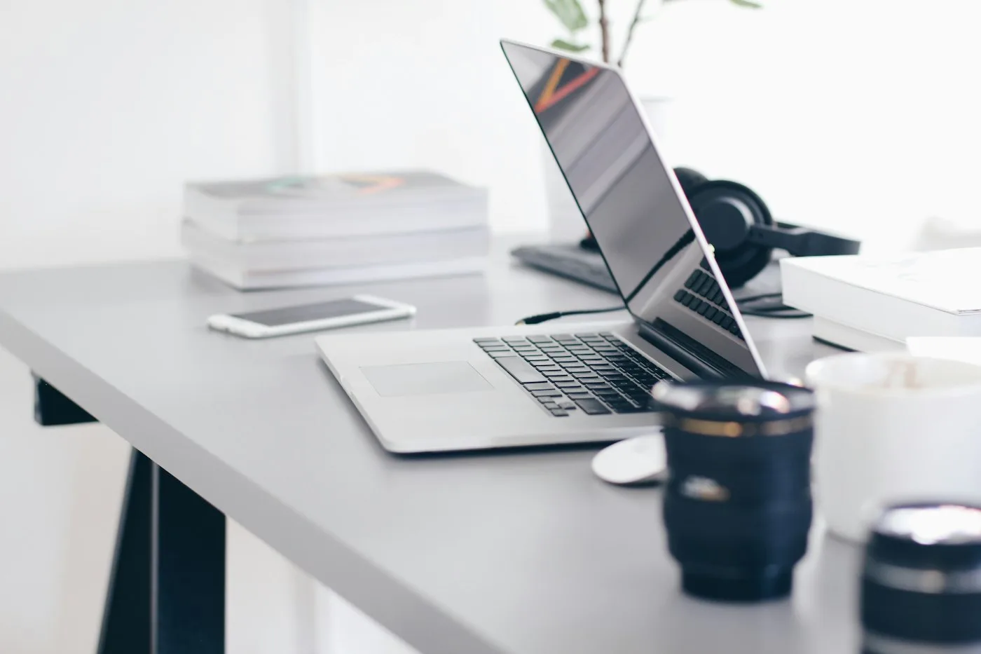 Silver laptop on a white table