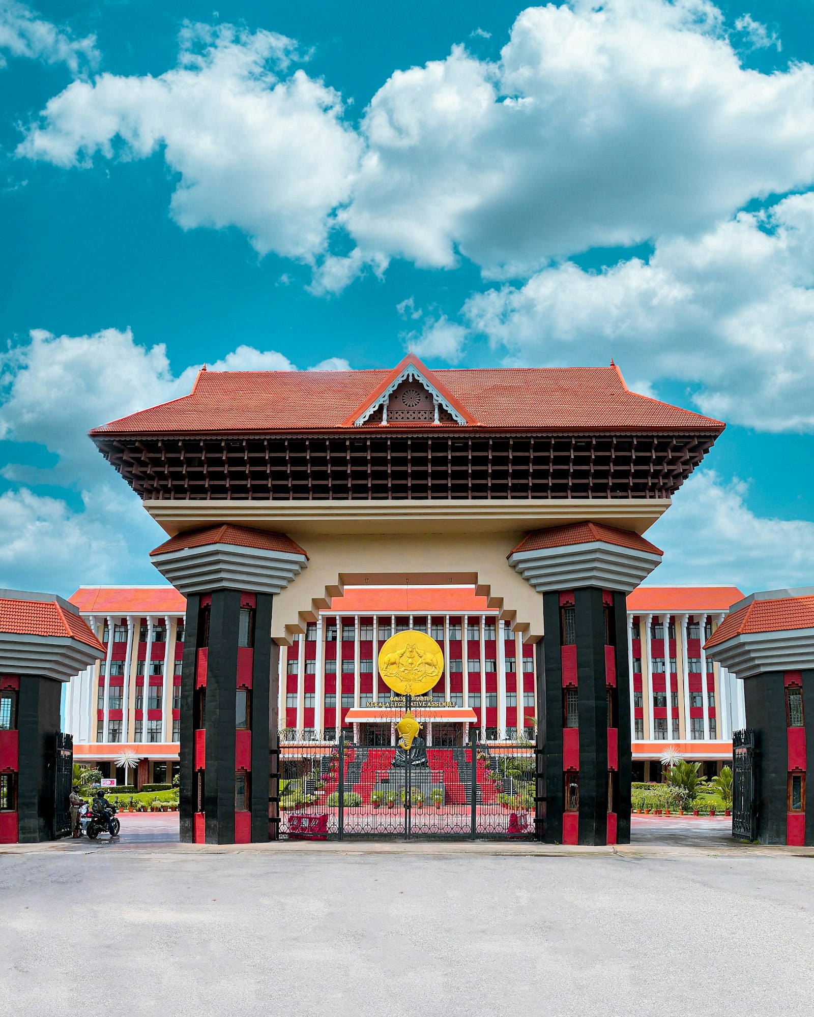 Building with a clock representing GST registration for property businesses in Karnataka