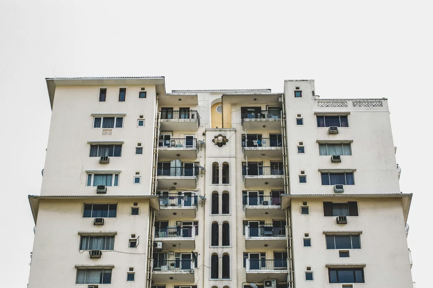 White high-rise building in daytime