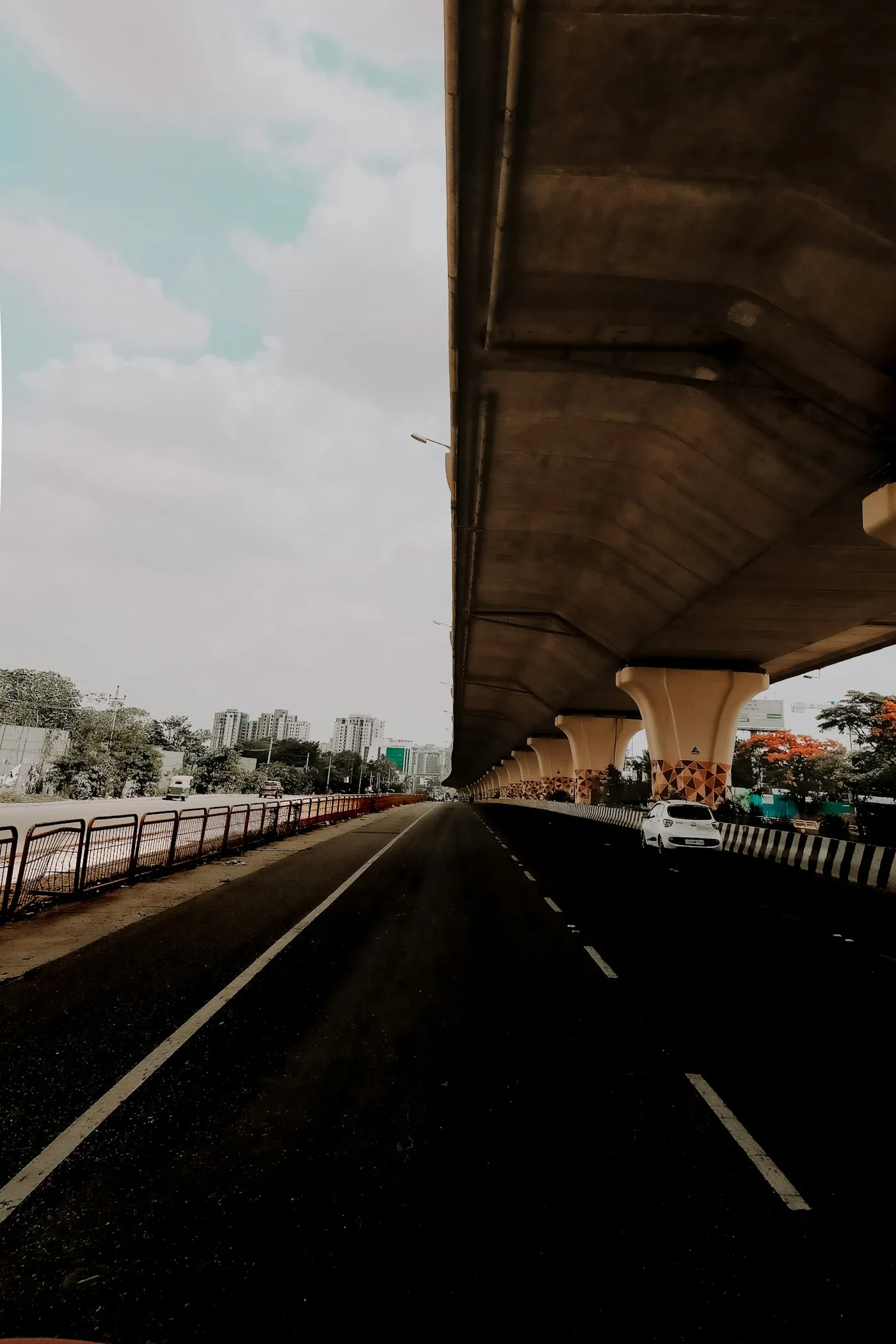 Pedestrians on a bridge in daylight