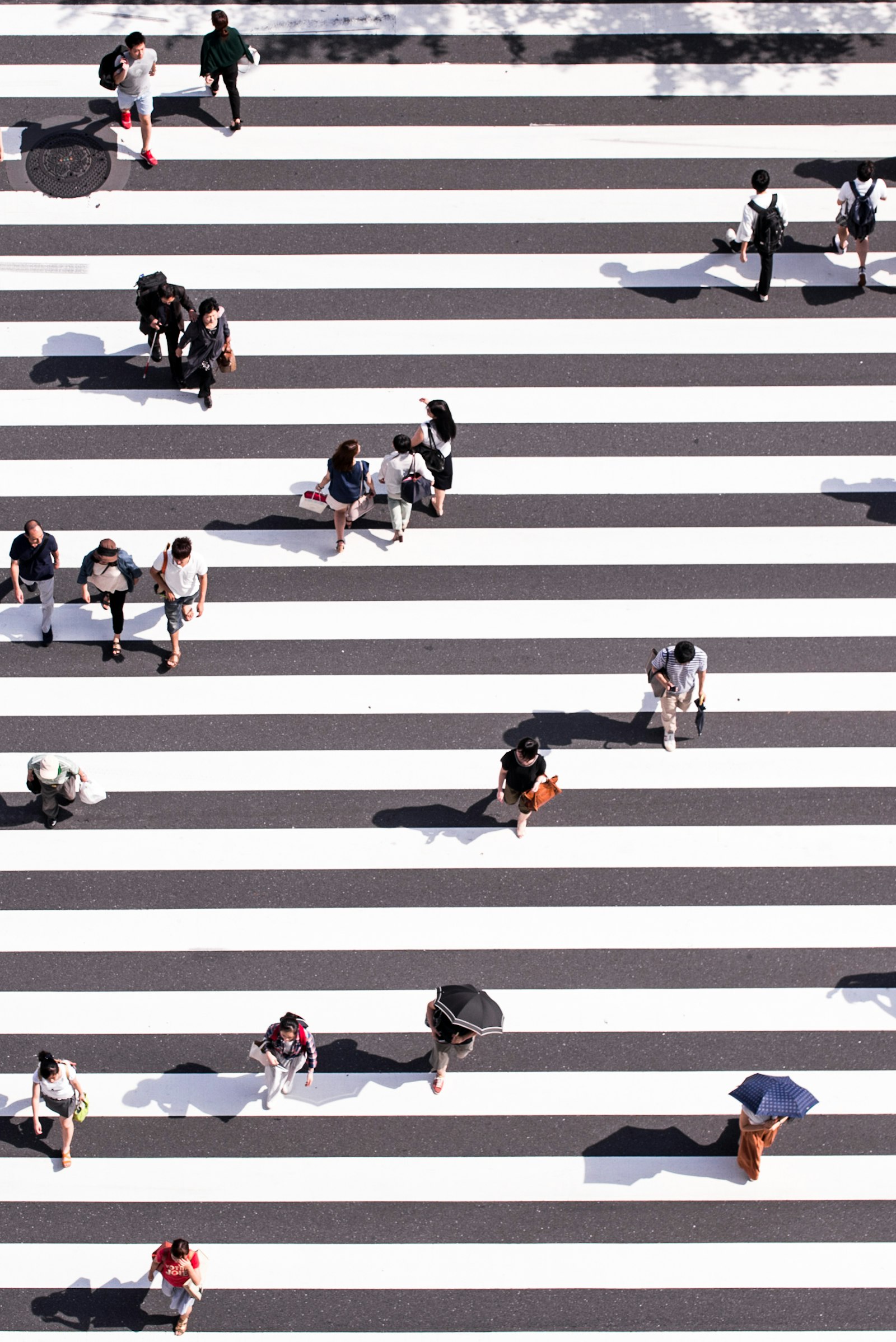 Aerial view of people walking on a pedestrian lane representing what every investor should check before buying in a new area