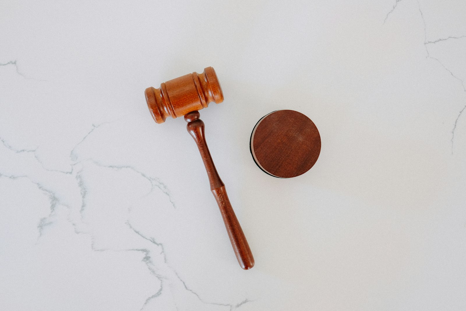 Wooden gavel on marble representing land easements and property rights in Karnataka