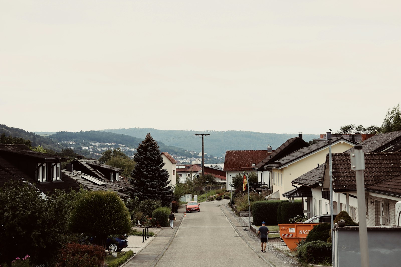 Suburban street with houses representing maintenance of common areas in housing societies in Karnataka