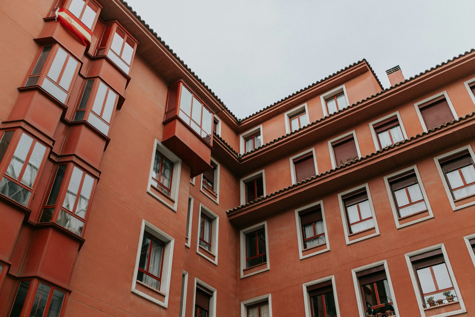 Brown concrete building representing Malleshwaram real estate prices and investment