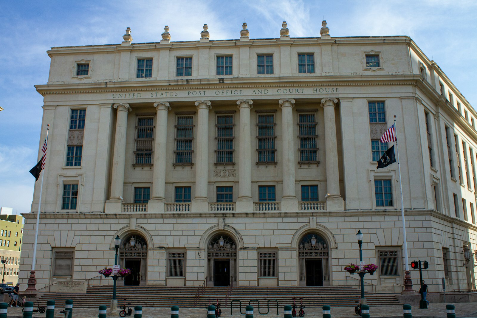 Government building with a flag representing occupancy certificate versus completion certificate in Karnataka