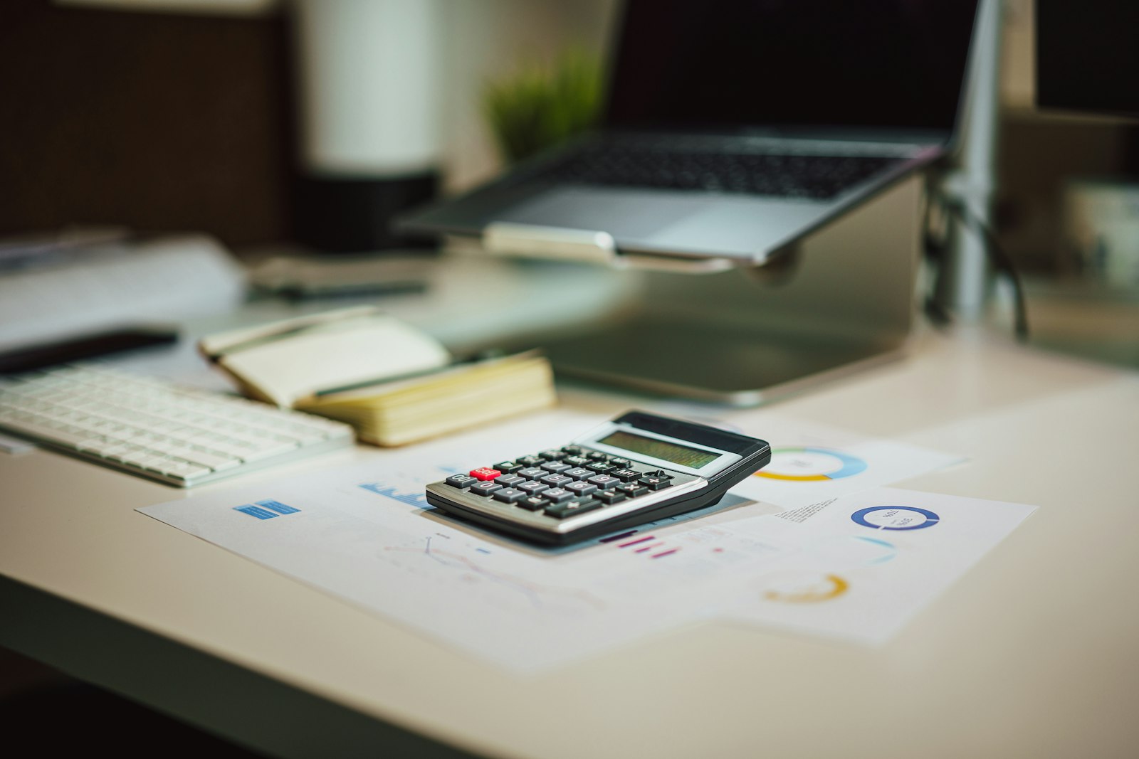 Calculator and financial documents representing NRI tax planning