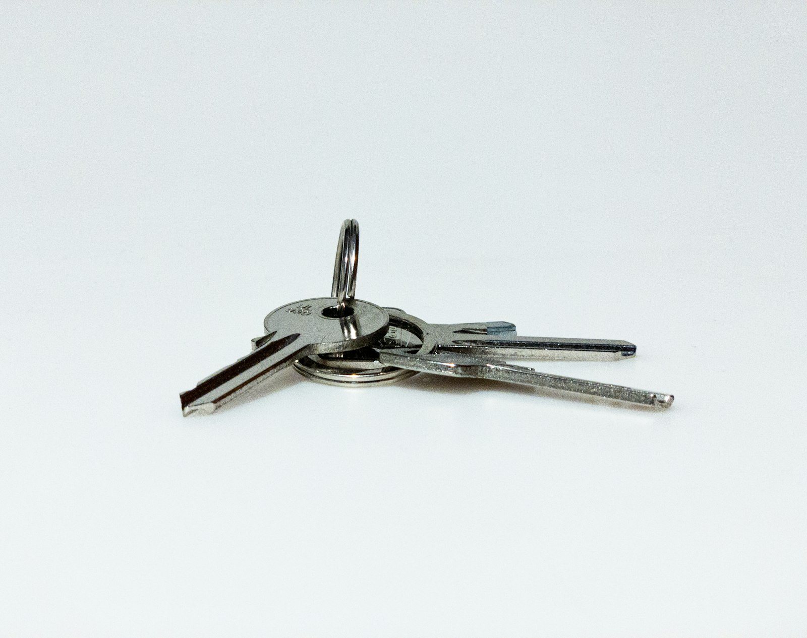Silver keys representing property inheritance rights for women in Karnataka