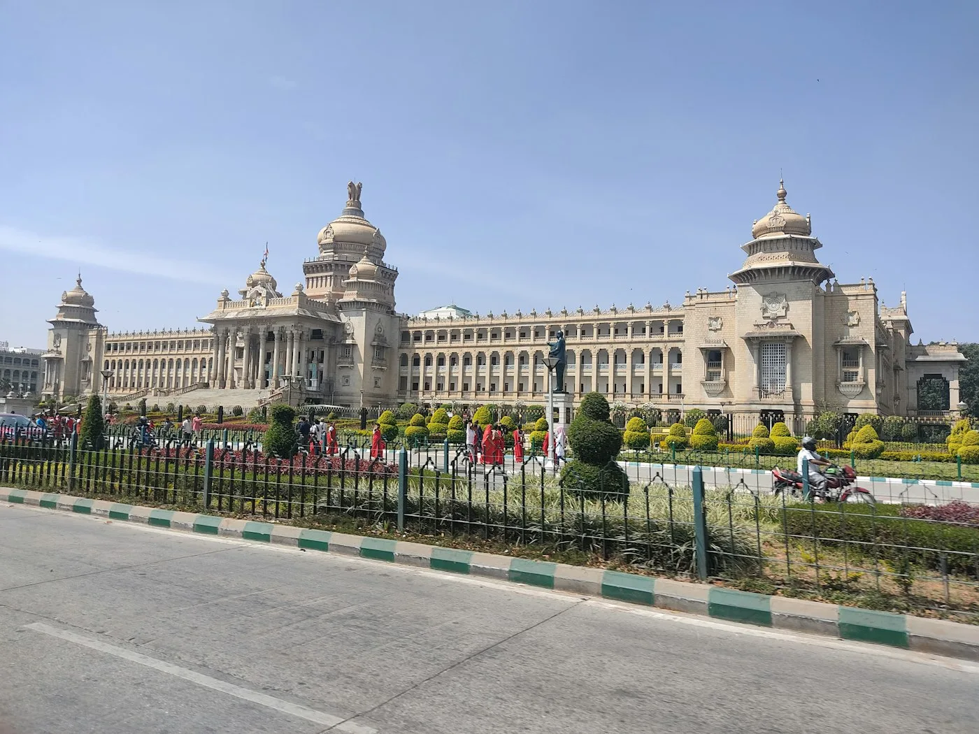 Large building with a fence in front of it