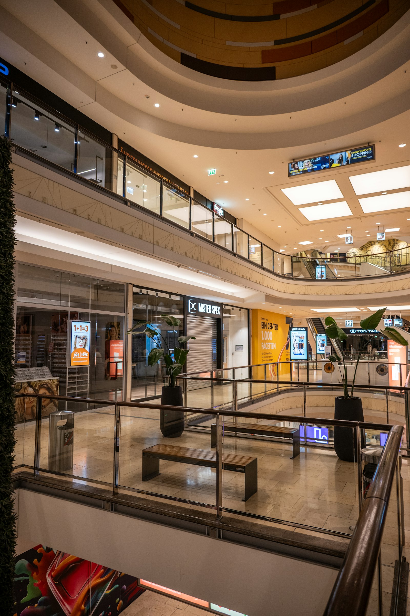 Modern shopping mall interior representing retail amenities near Thanisandra Bangalore