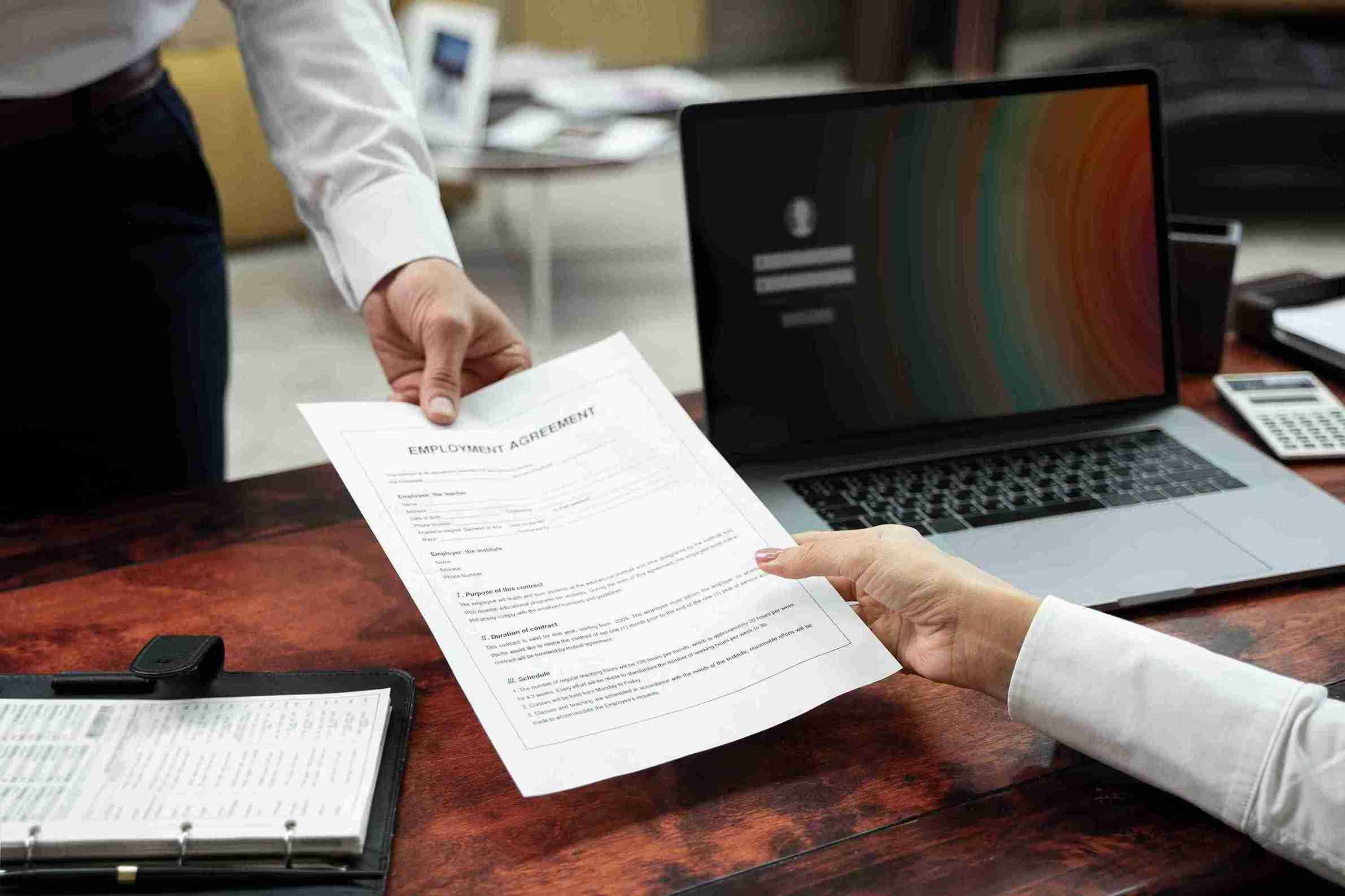 high-angle-hands-holding-document_11zon