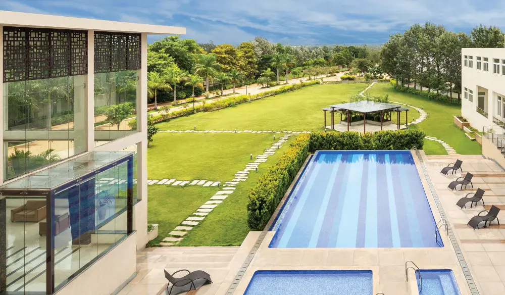 Clubhouse and amenities at Century Wintersun including swimming pool, gymnasium, and landscaped gardens