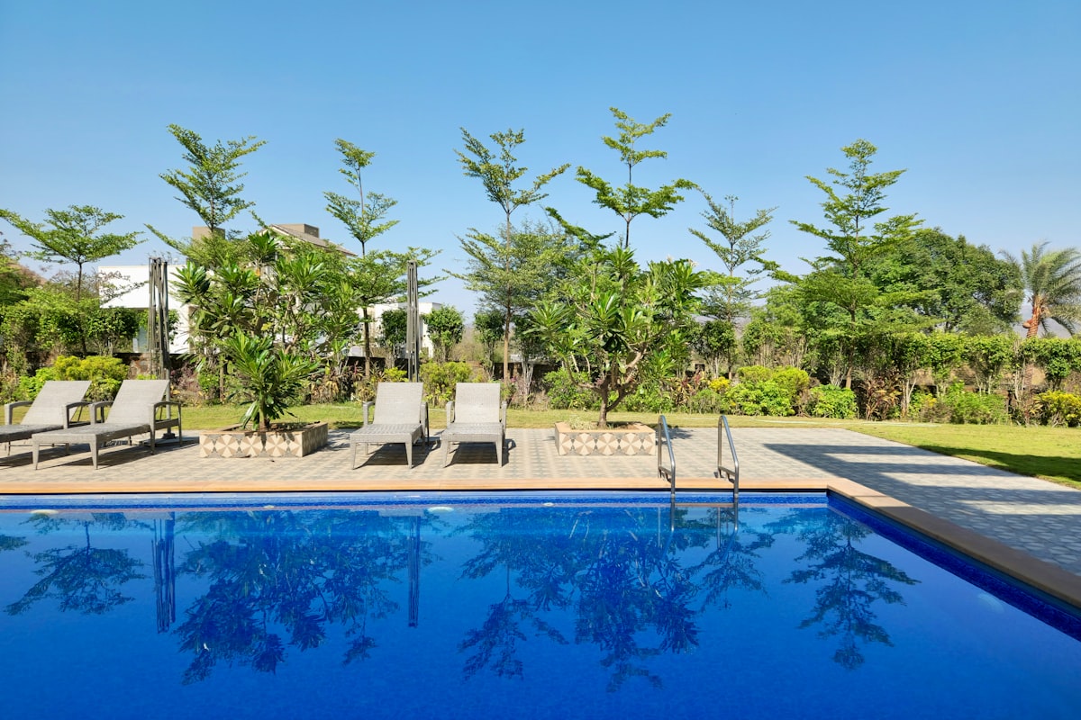 Swimming pool with lounge chairs